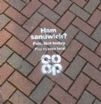 Co-op graffiti on pavement